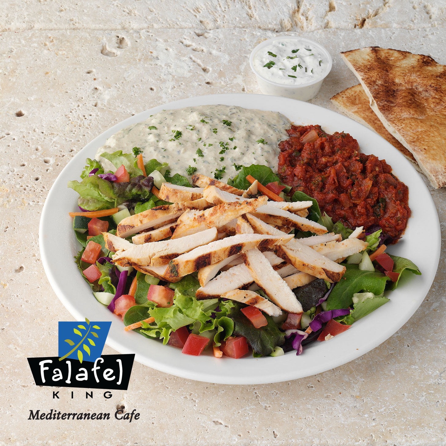 Grilled Chicken Plate|Marinated & Grilled Chicken with Tzatziki Sauce. Served with fresh mixed greens, 2 mediterranean sides & pita.